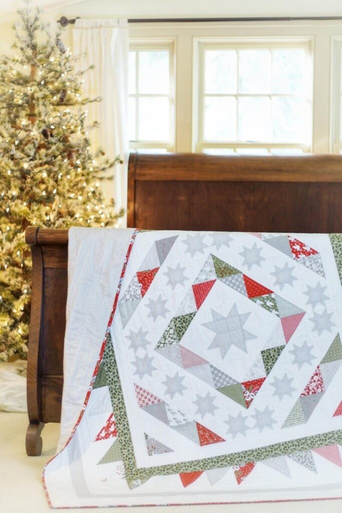 https://www.maplecottagedesigns.com/wp-content/uploads/2021/09/Christmas-Eve-Celebration-quilt-pattern-pic-1-683x1024.jpg