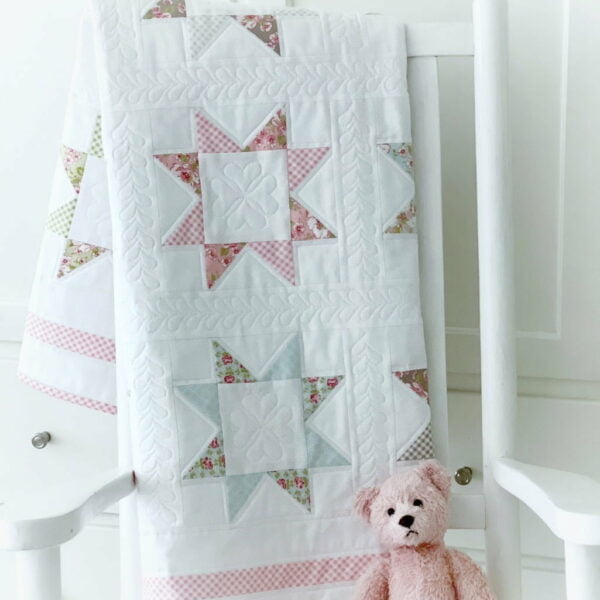 https://www.maplecottagedesigns.com/wp-content/uploads/2022/07/baby-quilt-patterns-600x600.jpeg