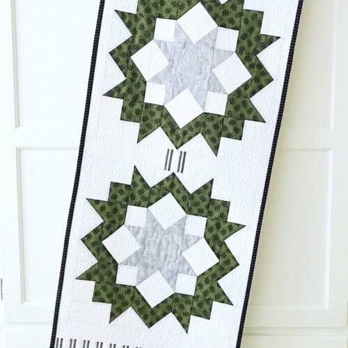 Evergreen Wreaths Table Runner Pattern draped