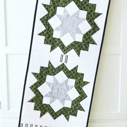 Evergreen Wreaths Table Runner Pattern draped